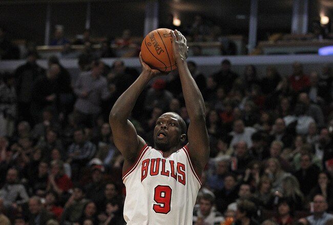 CHICAGO, IL - JANUARY 21: Loul Deng #9 of the Chicago Bulls puts up a shot against the Charlotte Bobcats at the United Center on January 21, 2012 in Chicago, Illinois. The Bulls defeated the Bobcats 95-89. NOTE TO USER: User expressly acknowledges and agrees that, by downloading and or using this photograph, User is consenting to the terms and conditions of the Getty Images License Agreement.  (Photo by Jonathan Daniel/Getty Images)
