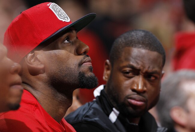 COLUMBUS, OH - NOVEMBER 29: LeBron James and Dwayne Wade of the NBA's Miami Heat look on during the first half of the game between the Ohio State Buckeyes and Duke Blue Devils at Value City Arena on November 29, 2011 in Columbus, Ohio. (Photo by Joe Robbins/Getty Images)