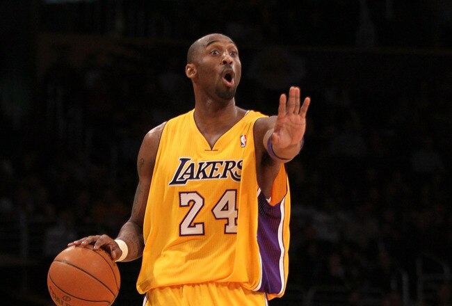 LOS ANGELES, CA - JANUARY 13:  Kobe Bryant #24 of the Los Angeles Lakers sgnals his offense as he controls the ball against against the Cleveland Cavaliers at Staples Center on January 13, 2012 in Los Angeles, California.  NOTE TO USER: User expressly acknowledges and agrees that, by downloading and or using this photograph, User is consenting to the terms and conditions of the Getty Images License Agreement.  (Photo by Stephen Dunn/Getty Images)
