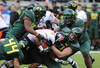 EUGENE, OR - NOVEMBER 26: Running back Jovan Stevenson #19 of the Oregon State Beavers is gang tackled by defensive end Brandon Hanna #44, defensive end Terrell Turner #45 o and defensive tackle Taylor Hart #66 of the Oregon Ducks in the second quarter of the game at Autzen Stadium on November 26, 2011 in Eugene, Oregon. (Photo by Steve Dykes/Getty Images)