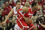 MADISON, WI - FEBRUARY 04:  Jared Sullinger #0 of the Ohio State Buckeyes moves against Jared Berggren #40 of the Wisconsin Badgers at Kohl Center on February 4, 2012 in Madison, Wisconsin. Ohio State defeated Wisconsin 58-52.  (Photo by Jonathan Daniel/Getty Images)