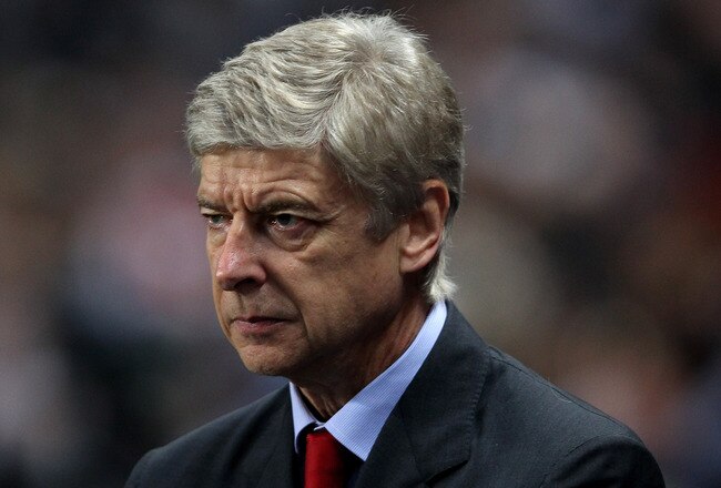 MANCHESTER, ENGLAND - DECEMBER 18:  Arsenal Manager Arsene Wenger looks on prior to the Barclays Premier League match between Manchester City and Arsenal at the Etihad Stadium on December 18, 2011 in Manchester, England.  (Photo by Alex Livesey/Getty Images)
