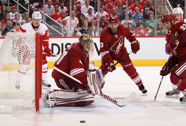 GLENDALE, AZ - FEBRUARY 06:  Goaltender Mike Smith #41 of the Phoenix Coyotes makes a pad save on the shot from the Detroit Red Wings during the NHL game at Jobing.com Arena on February 6, 2012 in Glendale, Arizona. The Coyotes defeated the Red Wings 3-1.  (Photo by Christian Petersen/Getty Images)