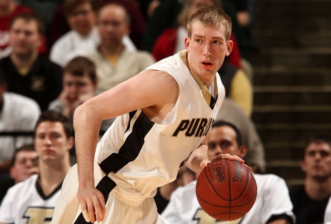 INDIANAPOLIS - MARCH 13:  Robbie Hummel #4 of the Purdue Boilermakers brings the ball up court against the Penn State Nittany Lions during the second round of the Big Ten Men's Basketball Tournament at Conseco Fieldhouse on March 13, 2009 in Indianapolis, Indiana.  (Photo by Jonathan Daniel/Getty Images)