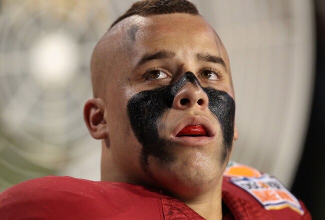 MIAMI, FL - JANUARY 03: Shayne Skov #11 of the Stanford Cardinal looks on from the bench against the Virginia Tech Hokies during the 2011 Discover Orange Bowl at Sun Life Stadium on January 3, 2011 in Miami, Florida. (Photo by Streeter Lecka/Getty Images)