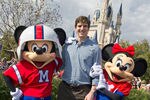 LAKE BUENA VISTA, FL - FEBRUARY 6:   In this handout image provided by Disney Parks, Super Bowl XLVI MVP and New York Giants quarterback Eli Manning poses with Mickey and Minnie Mouse on February 6, 2012 at the Magic Kingdom at Walt Disney World Resort in Lake Buena Vista, Florida.  Manning visited the theme park took place only one day after he led his team to a 21-17 victory over the New England Patriots in Super Bowl XLVI in Indianapolis.  Immediately following the game, Manning looked into TV cameras and shouted 'I'm Going to Disney World!'  He is the latest star in the famous Disney commercial series. (Photo by Gene Duncan/Disney Parks via Getty Images)