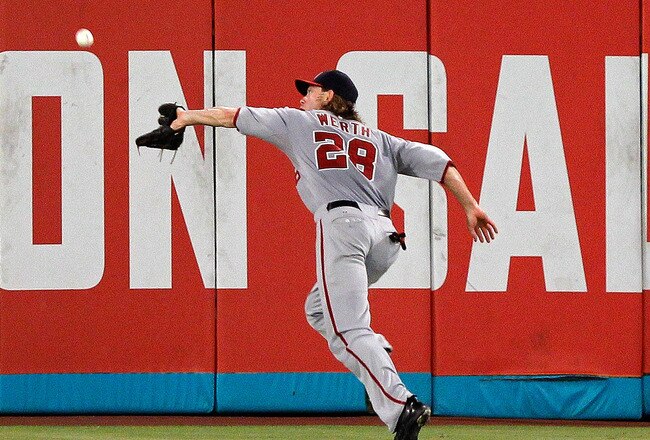 MIAMI GARDENS, FL - SEPTEMBER 27:  Jayson Werth #28 of the Washington Nationals makes a catch during a game against the Florida Marlins at Sun Life Stadium on September 27, 2011 in Miami Gardens, Florida.  (Photo by Mike Ehrmann/Getty Images)