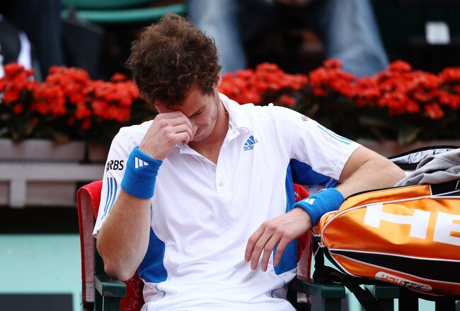 PARIS - MAY 30:  Andy Murray of Great Britain looks dejected after losing the second set during the men's singles fourth round match between Andy Murray of Great Britain and Tomas Berdych of Czech Republic at the French Open on day eight of the French Open at Roland Garros on May 30, 2010 in Paris, France.  (Photo by Julian Finney/Getty Images)