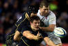 EDINBURGH, SCOTLAND - FEBRUARY 04:  Hooker Ross Ford of Scotland offloads the ball during the RBS Six Nations match between Scotland and England at Murrayfield Stadium on February 4, 2012 in Edinburgh, Scotland.  (Photo by David Rogers/Getty Images)