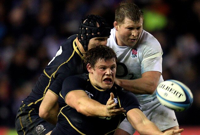 EDINBURGH, SCOTLAND - FEBRUARY 04:  Hooker Ross Ford of Scotland offloads the ball during the RBS Six Nations match between Scotland and England at Murrayfield Stadium on February 4, 2012 in Edinburgh, Scotland.  (Photo by David Rogers/Getty Images)