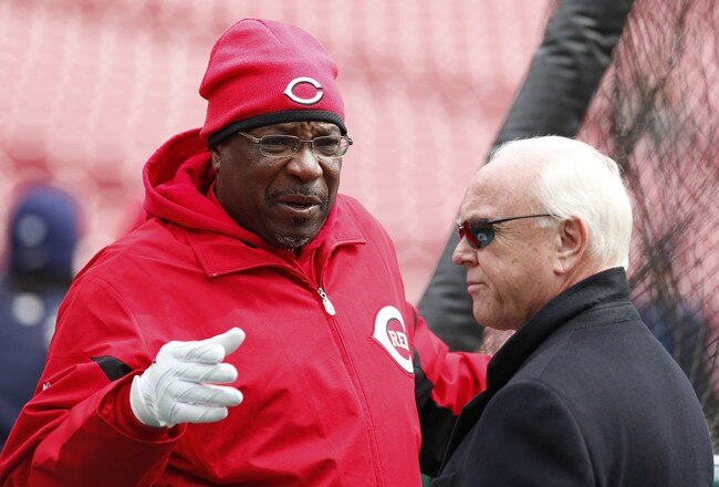 CINCINNATI, OH - MARCH 31: Cincinnati Reds manager Dusty Baker talks with general manager Walt Jocketty before the opening day game against the Milwaukee Brewers at Great American Ballpark on March 31, 2011 in Cincinnati, Ohio. (Photo by Joe Robbins/Getty Images)