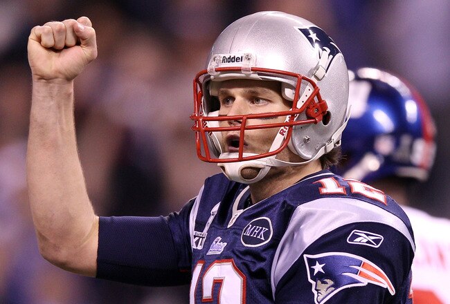 INDIANAPOLIS, IN - FEBRUARY 05:  Quarterback Tom Brady #12 of the New England Patriots reacts during the game against the New York Giants during Super Bowl XLVI at Lucas Oil Stadium on February 5, 2012 in Indianapolis, Indiana.  (Photo by Elsa/Getty Images)