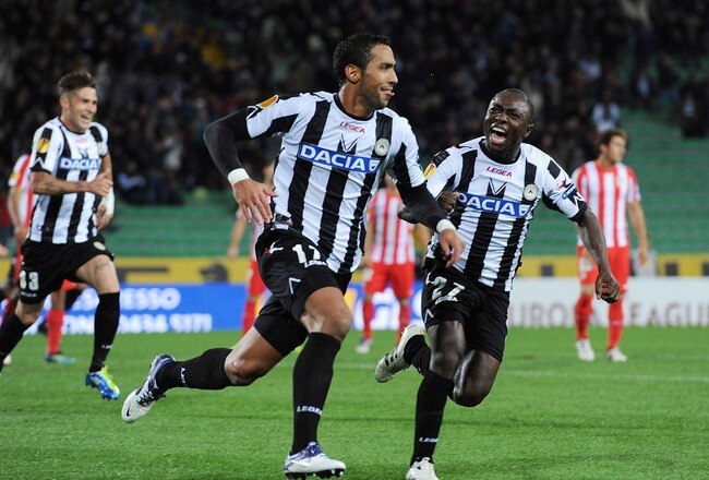 UDINE, ITALY - OCTOBER 20:  Medhi Benatia of Udinese celebrates with Pablo Armero (R) after scoring the opening goal during the UEFA Europa League group I match between Udinese Calcio and Club Atletico de Madrid at Stadio Friuli on October 20, 2011 in Udine, Italy.  (Photo by Dino Panato/Getty Images)