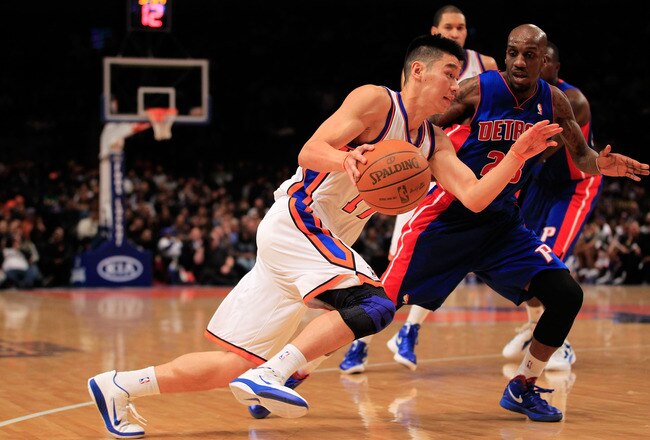 NEW YORK, NY - JANUARY 31: Jeremy Lin #17 of the New York Knicks drives past Detroit Pistons Walker Russell #23 of the Detroit Pistons at Madison Square Garden on January 31, 2012 in New York City.  NOTE TO USER: User expressly acknowledges and agrees that, by downloading and or using this photograph, User is consenting to the terms and conditions of the Getty Images License Agreement. (Photo by Chris Trotman/Getty Images)