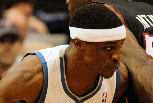 MINNEAPOLIS, MN - APRIL 1: Jonny Flynn #10 of the Minnesota Timberwolves dribbles around Joel Anthony #50 of the Miami Heat during a basketball game at Target Center on April 1, 2011 in Minneapolis, Minnesota. NOTE TO USER: User expressly acknowledges and agrees that, by downloading and or using this Photograph, user is consenting to the terms and conditions of the Getty Images License Agreement.  (Photo by Hannah Foslien /Getty Images)