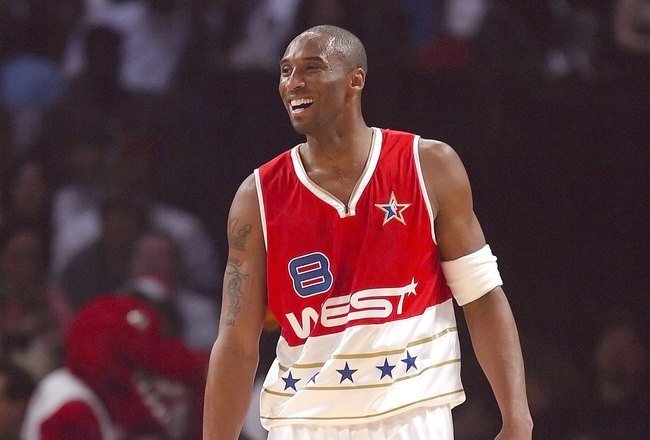 HOUSTON - FEBRUARY 19: Kobe Bryant #8 of the West Team smiles at the 2006 NBA All-Star Game during NBA All-Star Weekend at the Toyota Center on February 19, 2006 in Houston, Texas. NOTE TO USER: User expressly acknowledges and agrees that, by downloading and or using this photograph, User is consenting to the terms and conditions of the Getty Images License Agreement. (Photo by Ronald Martinez/Getty Images)