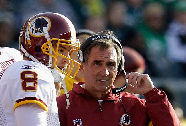 PHILADELPHIA, PA - JANUARY 01:  Rex Grossman #8 of the Washington Redskins talks with head coach Mike Shanahan during the second half against the Philadelphia Eagles at Lincoln Financial Field on January 1, 2012 in Philadelphia, Pennsylvania.  (Photo by Rob Carr/Getty Images)