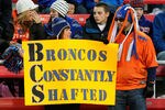 LAS VEGAS, NV - DECEMBER 22:  Fans of the Boise State Broncos hold a sign before the team played the Arizona State Sun Devils in the MAACO Bowl Las Vegas at Sam Boyd Stadium December 22, 2011 in Las Vegas, Nevada. Boise State won 56-24.  (Photo by Ethan Miller/Getty Images)