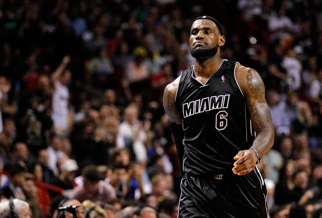 MIAMI, FL - JANUARY 29:  LeBron James #6 of the Miami Heat looks on during a game against the Chicago Bulls at American Airlines Arena on January 29, 2012 in Miami, Florida. NOTE TO USER: User expressly acknowledges and agrees that, by downloading and/or using this Photograph, User is consenting to the terms and conditions of the Getty Images License Agreement.  (Photo by Mike Ehrmann/Getty Images)