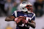 EAST RUTHERFORD, NJ - NOVEMBER 13:   Chad Ochocinco #85 of the New England Patriots runs with the ball at MetLife Stadium on November 13, 2011 in East Rutherford, New Jersey.  (Photo by Patrick McDermott/Getty Images)