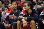 WASHINGTON, DC - JANUARY 30: Derrick Rose #1 (L) talks with teammate Joakim Noah #13 of the Chicago BuJoakim NDerrick Rose (R) during the second half against the Washington Wizards at Verizon Center on January 30, 2012 in Washington, DC. NOTE TO USER: User expressly acknowledges and agrees that, by downloading and or using this photograph, User is consenting to the terms and conditions of the Getty Images License Agreement.  (Photo by Rob Carr/Getty Images)
