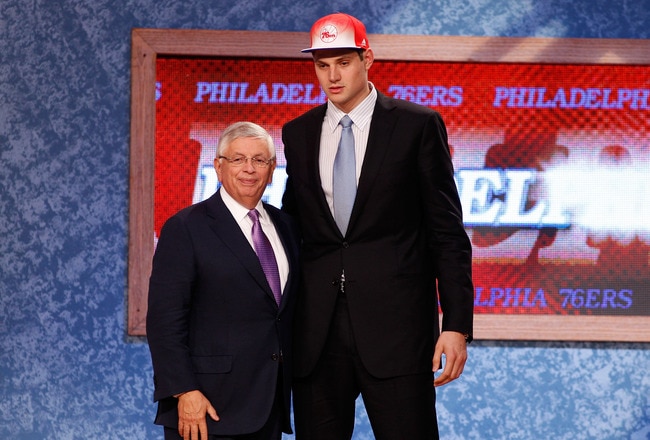 NEWARK, NJ - JUNE 23:  Nikola Vucevic from USC greets NBA Commissioner David Stern after he was selected #16 overall by the Philadelphia 76ers in the first round during the 2011 NBA Draft at the Prudential Center on June 23, 2011 in Newark, New Jersey.  NOTE TO USER: User expressly acknowledges and agrees that, by downloading and/or using this Photograph, user is consenting to the terms and conditions of the Getty Images License Agreement.  (Photo by Mike Stobe/Getty Images)