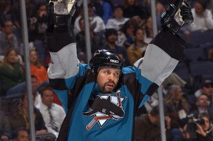WASHINGTON, D.C. - NOVEMBER 19:  Right wing Owen Nolan #11 of the San Jose Sharks celebrates a goal against the Washington Capitals during the NHL game at the MCI Center on November 19, 2002 in Washington D.C.  The Sharks won 3-2.  (Photo by Doug Pensinger/Getty Images/NHLI)