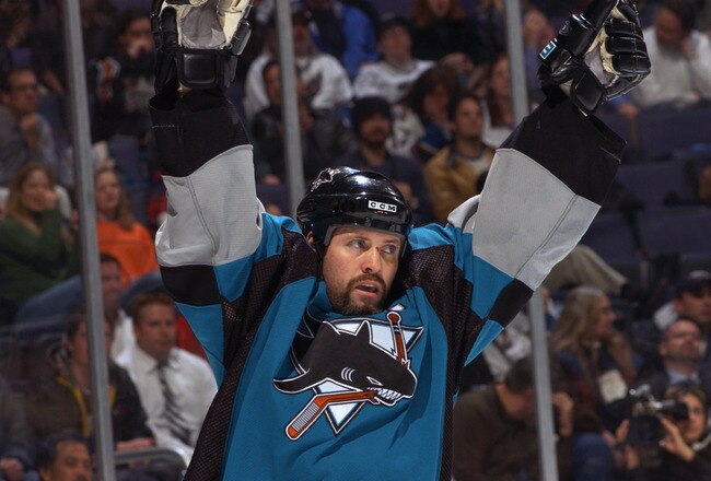 WASHINGTON, D.C. - NOVEMBER 19:  Right wing Owen Nolan #11 of the San Jose Sharks celebrates a goal against the Washington Capitals during the NHL game at the MCI Center on November 19, 2002 in Washington D.C.  The Sharks won 3-2.  (Photo by Doug Pensinger/Getty Images/NHLI)