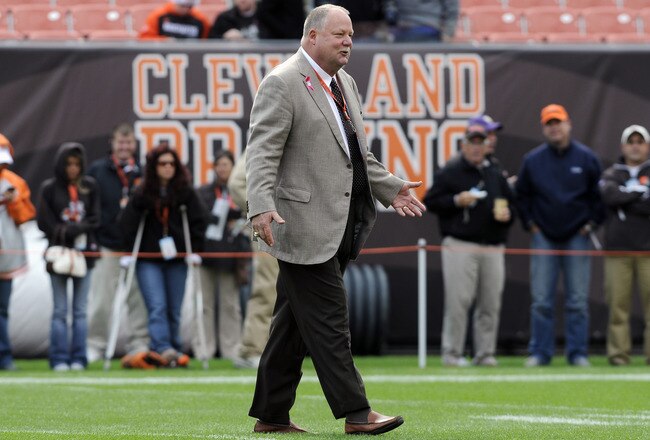 CLEVELAND, OH - OCTOBER 2:  Cleveland Browns president Mike Holmgren greets people on the field prior to to the game between the Cleveland Browns and the Tennessee Titans at Cleveland Browns Stadium on October 2, 2011 in Cleveland, Ohio. (Photo by Jason Miller/Getty Images)