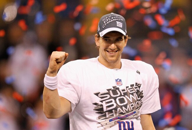 INDIANAPOLIS, IN - FEBRUARY 05:  Quarterback Eli Manning #10 of the New York Giants smiles after the Giants defeated the Patriots by a score of 21-17 in Super Bowl XLVI at Lucas Oil Stadium on February 5, 2012 in Indianapolis, Indiana.  (Photo by Rob Carr/Getty Images)