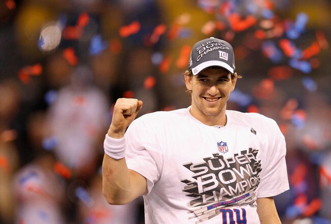 INDIANAPOLIS, IN - FEBRUARY 05:  Quarterback Eli Manning #10 of the New York Giants smiles after the Giants defeated the Patriots by a score of 21-17 in Super Bowl XLVI at Lucas Oil Stadium on February 5, 2012 in Indianapolis, Indiana.  (Photo by Rob Carr/Getty Images)