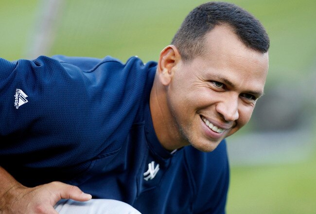 DETROIT, MI - OCTOBER 04: Alex Rodriguez #13 of the New York Yankees looks on while stretching prior to playing the Detroit Tigers in game four of the American League Division Series at Comerica Park on October 4,  2011 in Detroit, Michigan. (Photo by Gregory Shamus/Getty Images)