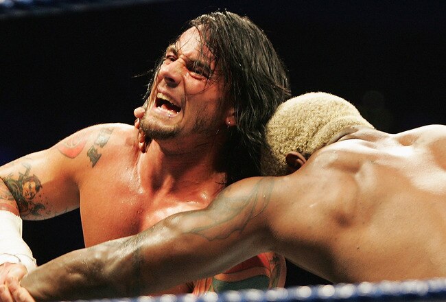 SYDNEY, AUSTRALIA - JUNE 15:  CM Punk wrestles Shelton Benjamin during WWE Smackdown at Acer Arena on June 15, 2008 in Sydney, Australia.  (Photo by Gaye Gerard/Getty Images)