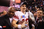 INDIANAPOLIS, IN - FEBRUARY 05:  Quarterback Eli Manning #10 of the New York Giants celebrates after defeating the New England Patriots 21-17 in Super Bowl XLVI at Lucas Oil Stadium on February 5, 2012 in Indianapolis, Indiana.  (Photo by Ezra Shaw/Getty Images)