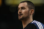 BOSTON, MA - JANUARY 03:  Kevin Love #42 of the Minnesota Timberwolves looks on before the game against the Boston Celtics on January 3, 2011 at the TD Garden in Boston, Massachusetts. NOTE TO USER: User expressly acknowledges and agrees that, by downloading and/or using this Photograph, User is consenting to the terms and conditions of the Getty Images License Agreement.  (Photo by Elsa/Getty Images)