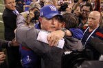 INDIANAPOLIS, IN - FEBRUARY 05:  Head coach Tom Coughlin of the New York Giants (L) hugs head coach Bill Belichick of the New England Patriots after the  Giants defeated the Patriots by a score of 21-17 in Super Bowl XLVI at Lucas Oil Stadium on February 5, 2012 in Indianapolis, Indiana.  (Photo by Ezra Shaw/Getty Images)
