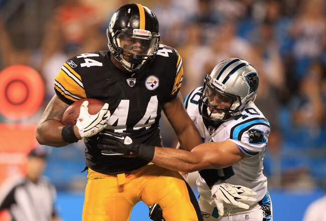 CHARLOTTE, NC - SEPTEMBER 01:  Weslye Saunders #44 of the Pittsburgh Steelers catches a touchdown against Michael Greco #40 the Carolina Panthers during their preseason game at Bank of America Stadium on September 1, 2011 in Charlotte, North Carolina.  (Photo by Streeter Lecka/Getty Images)
