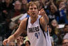 DALLAS, TX - JANUARY 04:  Dirk Nowitzki #41 of the Dallas Mavericks reacts after scoring against the Phoenix Suns at American Airlines Center on January 4, 2012 in Dallas, Texas. Nowitzki was playing in his 1,000 career game.  NOTE TO USER: User expressly acknowledges and agrees that, by downloading and/or using this Photograph, user is consenting to the terms and conditions of the Getty Images License Agreement.  (Photo by Ronald Martinez/Getty Images)