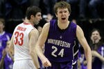 INDIANAPOLIS, IN - MARCH 11:  John Shurna #24 of the Northwestern Wildcats reacts against the Ohio State Buckeyes during the quarterfinals of the 2011 Big Ten Men's Basketball Tournament at Conseco Fieldhouse on March 11, 2011 in Indianapolis, Indiana.  (Photo by Andy Lyons/Getty Images)
