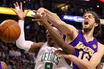 BOSTON - JUNE 10:  Pau Gasol #16 of the Los Angeles Lakers disruptes a shot attempt by Rajon Rondo #9 of the Boston Celltics during Game Four of the 2010 NBA Finals on June 10, 2010 at TD Garden in Boston, Massachusetts. NOTE TO USER: User expressly acknowledges and agrees that, by downloading and/or using this Photograph, user is consenting to the terms and conditions of the Getty Images License Agreement.  (Photo by Ronald Martinez/Getty Images)
