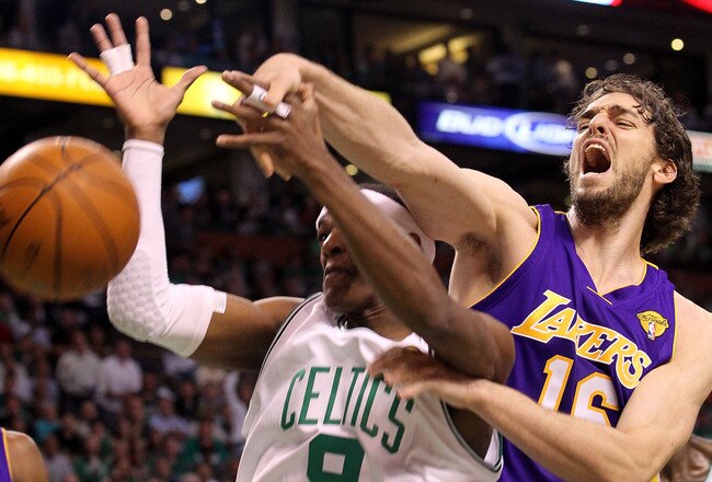 BOSTON - JUNE 10:  Pau Gasol #16 of the Los Angeles Lakers disruptes a shot attempt by Rajon Rondo #9 of the Boston Celltics during Game Four of the 2010 NBA Finals on June 10, 2010 at TD Garden in Boston, Massachusetts. NOTE TO USER: User expressly acknowledges and agrees that, by downloading and/or using this Photograph, user is consenting to the terms and conditions of the Getty Images License Agreement.  (Photo by Ronald Martinez/Getty Images)