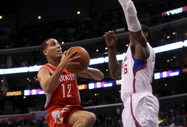 LOS ANGELES, CA - JANUARY 04:  Kevin Martin #12 of the Houston Rockets goes up against DeAndre Jordan #6 of the Los Angeles Clippers at Staples Center on January 4, 2012 in Los Angeles, California.  NOTE TO USER: User expressly acknowledges and agrees that, by downloading and or using this photograph, User is consenting to the terms and conditions of the Getty Images License Agreement.  (Photo by Stephen Dunn/Getty Images)