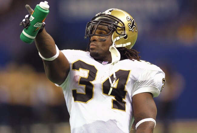 7 Oct 2001: Ricky Williams #34 of the New Orleans Saints points to the scoreboard during the game against the Minnesota Vikings at the Superdome in New Orleans, Louisiana. The Saints won 28-15. DIGITAL IMAGE. Mandatory Credit: Ronald Martinez/ALLSPORT
