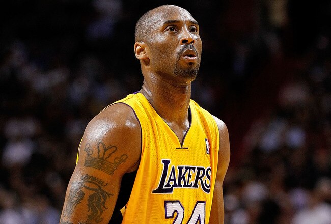 MIAMI, FL - JANUARY 19:  Kobe Bryant #24 of the Los Angeles Lakers lshoots a free throw during a game against the Miami Heat at American Airlines Arena on January 19, 2012 in Miami, Florida. NOTE TO USER: User expressly acknowledges and agrees that, by downloading and/or using this Photograph, User is consenting to the terms and conditions of the Getty Images License Agreement.  (Photo by Mike Ehrmann/Getty Images)