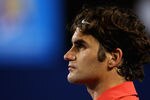MELBOURNE, AUSTRALIA - JANUARY 26:  Roger Federer of Switzerland looks on in his semifinal match against Rafael Nadal of Spain during day eleven of the 2012 Australian Open at Melbourne Park on January 26, 2012 in Melbourne, Australia.  (Photo by Lucas Dawson/Getty Images)