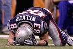 INDIANAPOLIS, IN - FEBRUARY 05:  Wes Welker #83 of the New England Patriots lays on the ground in the fourth quarter during Super Bowl XLVI at Lucas Oil Stadium on February 5, 2012 in Indianapolis, Indiana.  (Photo by Elsa/Getty Images)
