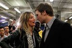 INDIANAPOLIS, IN - FEBRUARY 05:  Tom Brady #12 of the New England Patriots chats with his wife Gisele Bundchen after losing to the New York Giants by a score of 21-17 in Super Bowl XLVI at Lucas Oil Stadium on February 5, 2012 in Indianapolis, Indiana.  (Photo by Rob Carr/Getty Images)