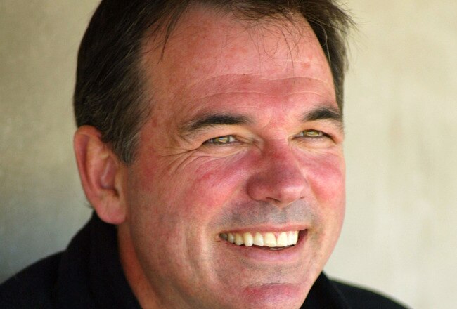 PHOENIX - MARCH 7:  General Manager Billy Beane of the Oakland Athletics looks on during the MLB spring training game against the Arizona Diamondbacks on March 7, 2005 at Phoenix Municipal Stadium in Phoenix, Arizona. The A's defeated the Diamondbacks 5-0.  (Photo by Christian Petersen/Getty Images)