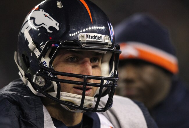 FOXBORO, MA - JANUARY 14:  Tim Tebow #15 of the Denver Broncos looks on against the New England Patriots during their AFC Divisional Playoff Game at Gillette Stadium on January 14, 2012 in Foxboro, Massachusetts.  (Photo by Jim Rogash/Getty Images)