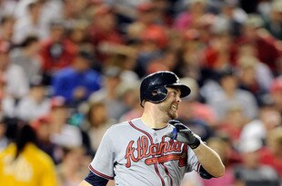 WASHINGTON, DC - SEPTEMBER 23:  Brian McCann #16 of the Atlanta Braves hits a double in the fifth inning against the Washington Nationals at Nationals Park on September 23, 2011 in Washington, DC. Atlanta won the game 7-4.  (Photo by Greg Fiume/Getty Images)